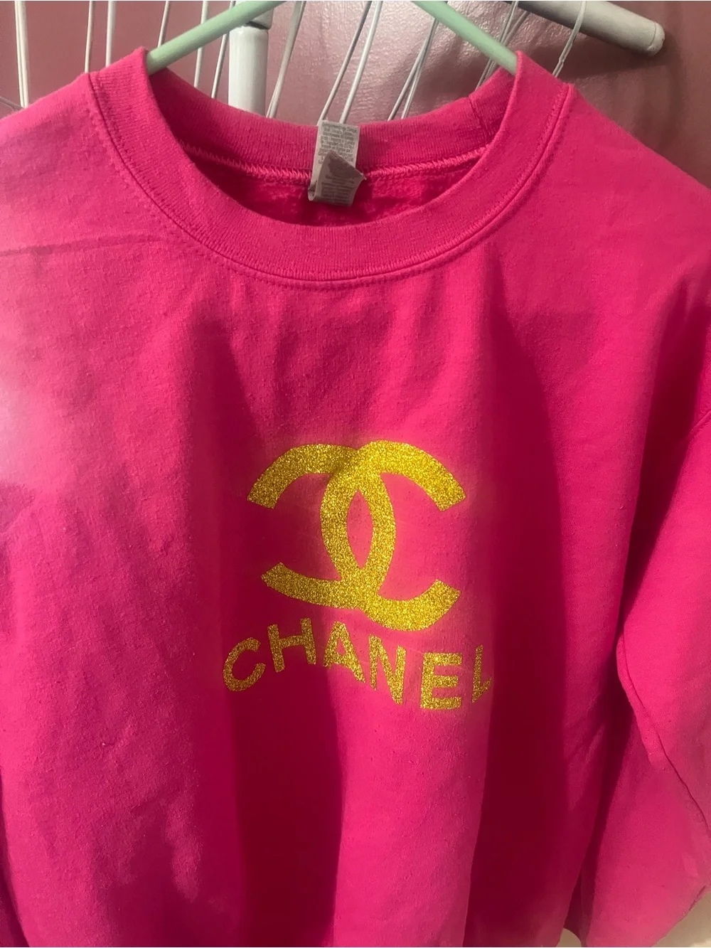 CHANEL Hot Pink Sweatshirt with Gold Logo